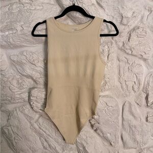 OQQ Cream Ribbed Sleeveless Bodysuit
